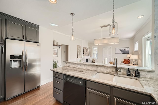 5101 Meade St, Denver, CO 80221 - kitchen featuring stainless steel fridge, wood finished floors, a sink, crown molding, and dishwasher