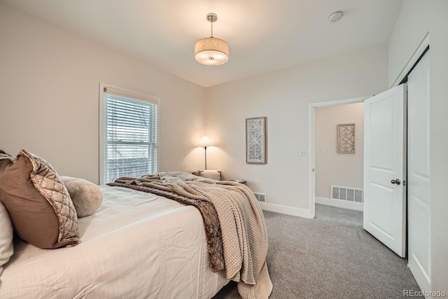 5101 Meade St, Denver, CO 80221 - bedroom with carpet flooring, baseboards, and visible vents