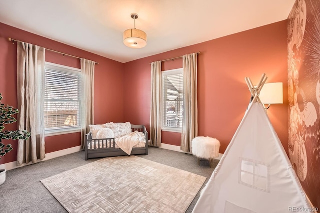 5101 Meade St, Denver, CO 80221 - carpeted bedroom with baseboards and multiple windows