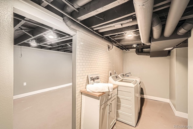 5101 Meade St, Denver, CO 80221 - laundry room featuring separate washer and dryer, laundry area, and baseboards