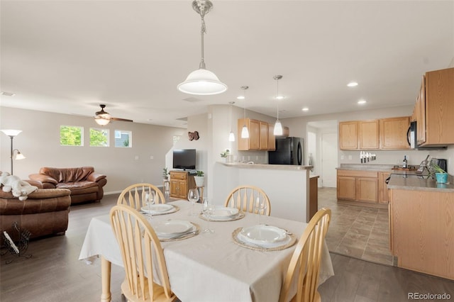 dining space with light wood-type flooring, ceiling fan, and recessed lighting