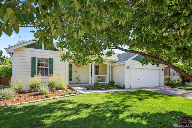 829 Sanctuary Cir, Longmont, CO 80504 - ranch-style home with a garage, concrete driveway, a front yard, and a porch