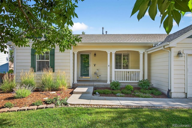 829 Sanctuary Cir, Longmont, CO 80504 - view of front of property featuring a porch and a shingled roof