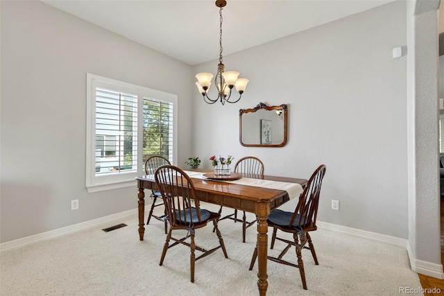 829 Sanctuary Cir, Longmont, CO 80504 - dining room with a chandelier and baseboards