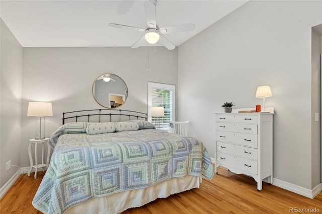 829 Sanctuary Cir, Longmont, CO 80504 - bedroom featuring light wood-type flooring, lofted ceiling, and a ceiling fan