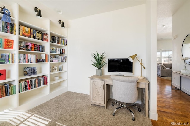 home office featuring hardwood / wood-style floors