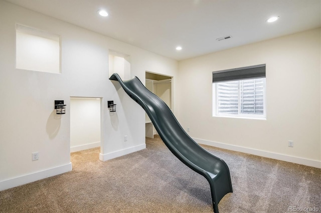 workout area with carpet floors