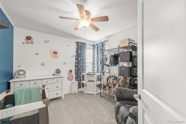 1510 S De Gaulle Cir, Aurora, CO 80018 - living area with ceiling fan, light carpet, and a textured ceiling