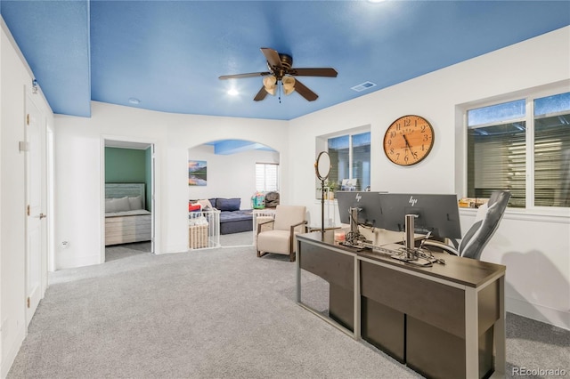 1510 S De Gaulle Cir, Aurora, CO 80018 - office area with arched walkways, a ceiling fan, carpet flooring, and baseboards