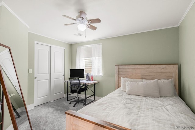1510 S De Gaulle Cir, Aurora, CO 80018 - bedroom featuring ornamental molding, carpet flooring, a closet, ceiling fan, and a desk