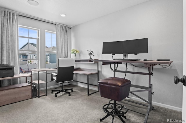 carpeted office with baseboards