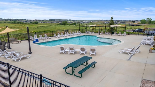 6185 Saddle Bow Ave, Parker, CO 80134 - community pool with a patio