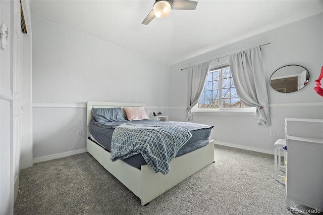 bedroom featuring a ceiling fan, baseboards, and carpet