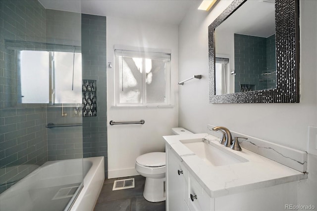 full bathroom featuring tile patterned flooring, vanity, toilet, and plenty of natural light