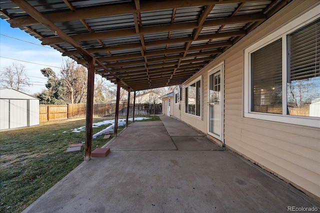 view of patio / terrace featuring a shed