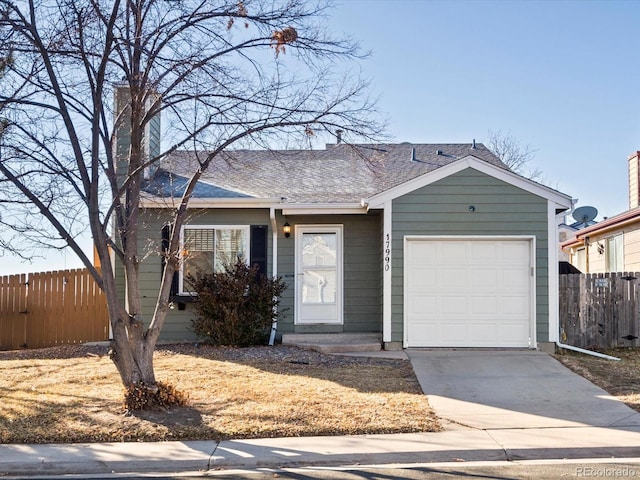 single story home featuring a garage