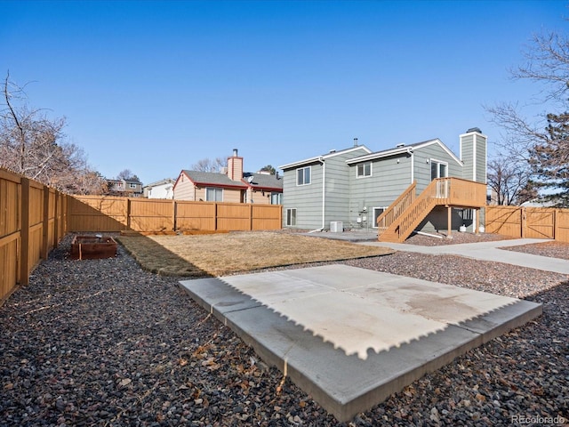 back of property featuring a patio