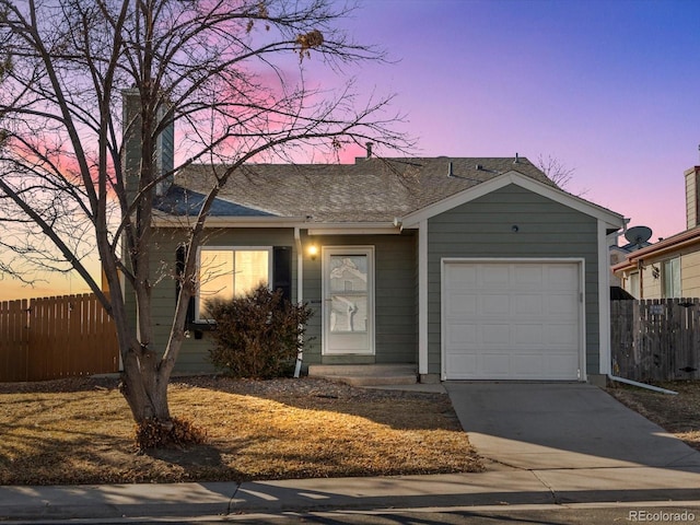 ranch-style home with a garage