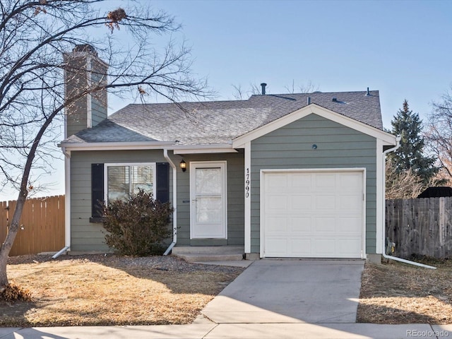 ranch-style home featuring a garage