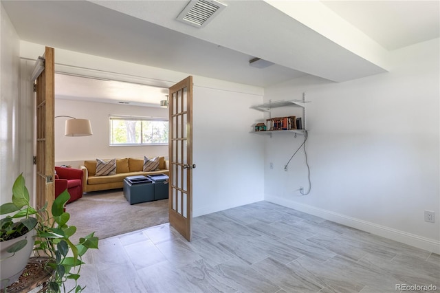 5983 W Indore Pl, Littleton, CO 80128 - unfurnished room featuring french doors and baseboards