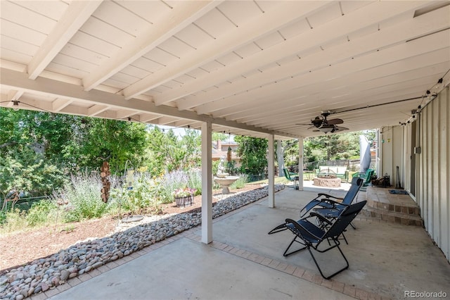5983 W Indore Pl, Littleton, CO 80128 - fenced backyard featuring a patio area and ceiling fan