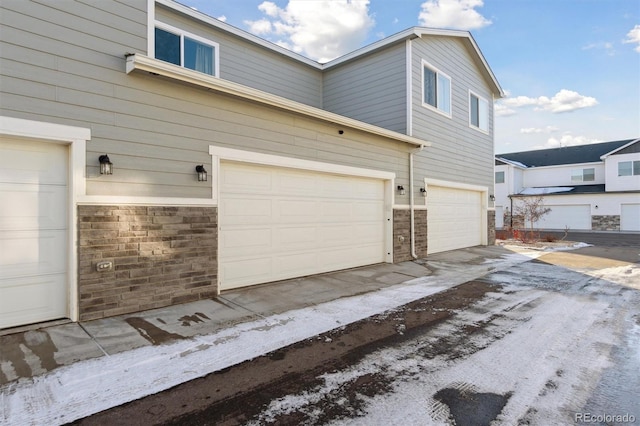 exterior space with a garage