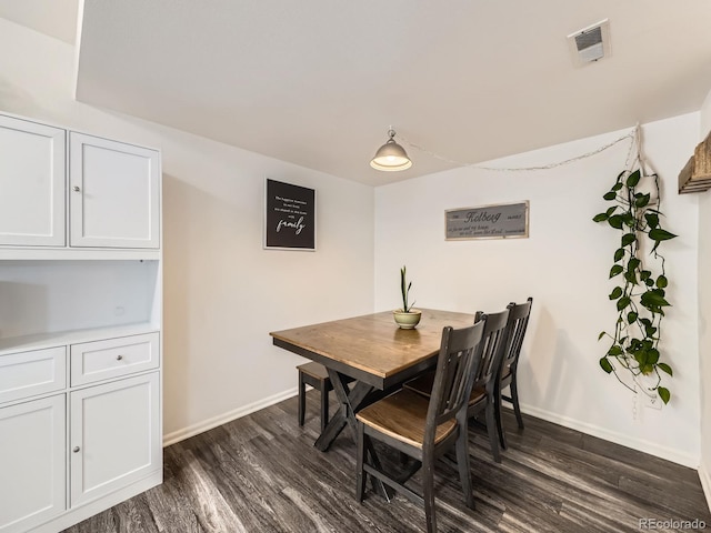 4904 E 125th Ave, Thornton, CO 80241 - dining room featuring dark wood-type flooring
