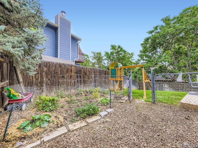 4904 E 125th Ave, Thornton, CO 80241 - fenced backyard with a playground