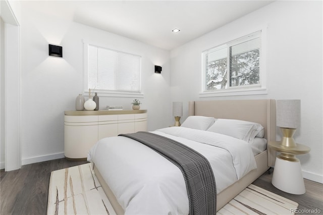 5886 S Logan St, Centennial, CO 80121 - bedroom featuring wood finished floors, baseboards, and recessed lighting