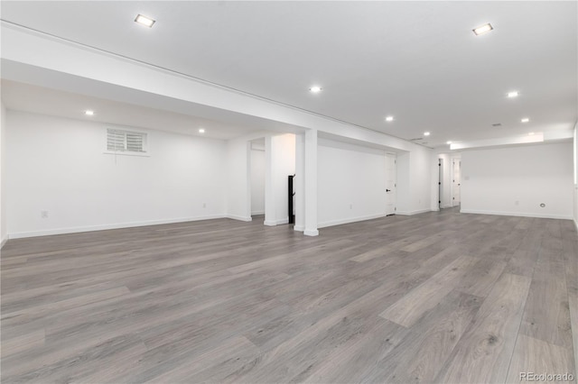 5886 S Logan St, Centennial, CO 80121 - finished below grade area featuring wood finished floors, baseboards, and recessed lighting