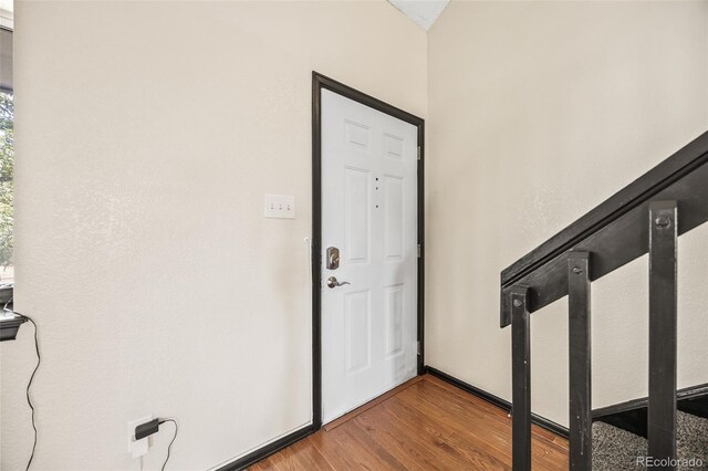 12099 Forest St, Thornton, CO 80241 - entryway with wood finished floors