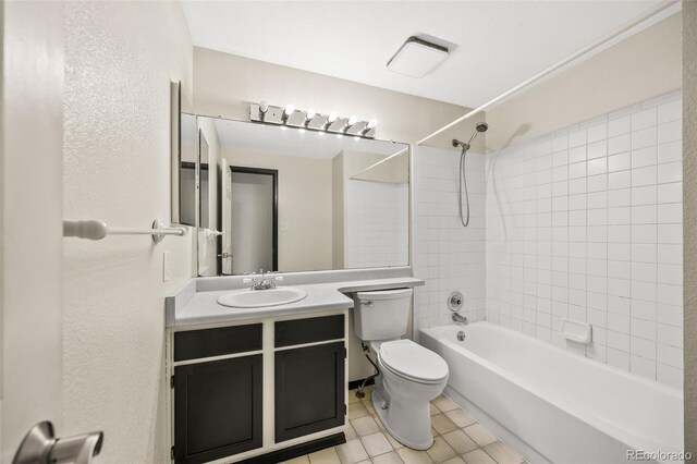12099 Forest St, Thornton, CO 80241 - full bathroom featuring shower / bathtub combination, vanity, and tile patterned flooring