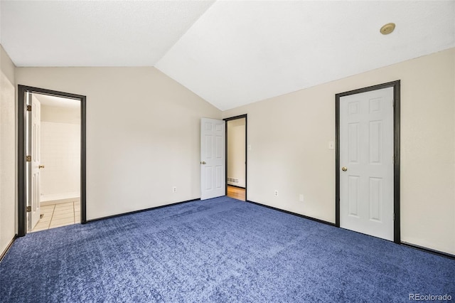 12099 Forest St, Thornton, CO 80241 - unfurnished bedroom featuring lofted ceiling, carpet, and connected bathroom