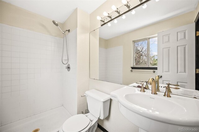 12099 Forest St, Thornton, CO 80241 - full bath with a sink and tiled shower