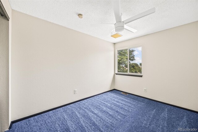 12099 Forest St, Thornton, CO 80241 - carpeted empty room featuring a smoke detector, a ceiling fan, and a textured ceiling