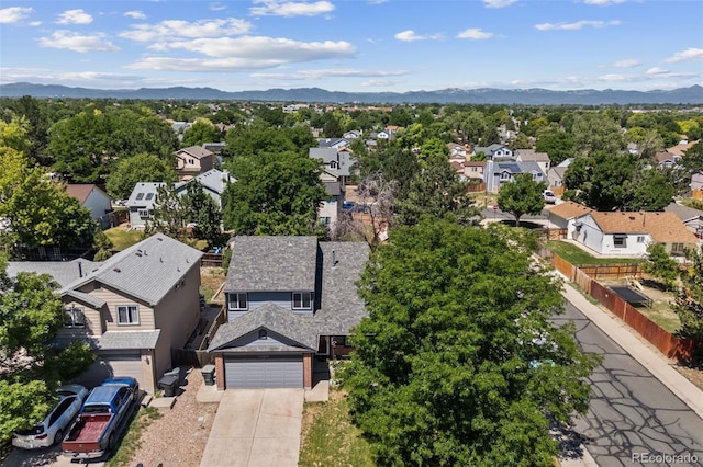 12099 Forest St, Thornton, CO 80241 - aerial view of residential area with a mountain backdrop