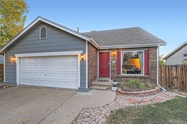 view of front of property featuring a garage