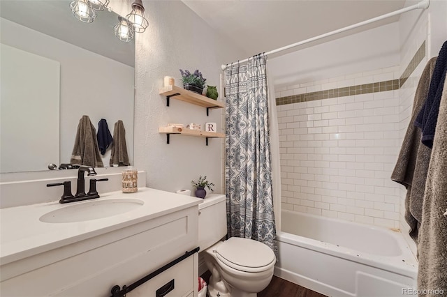 full bathroom featuring toilet, shower / bath combo with shower curtain, hardwood / wood-style floors, and vanity