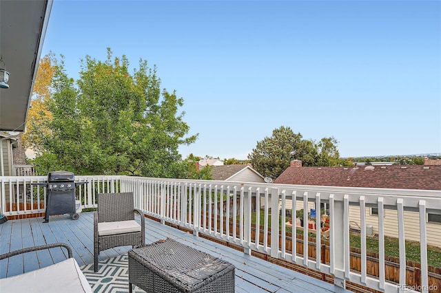 wooden terrace with grilling area