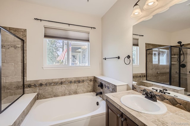 bathroom with vanity and plus walk in shower