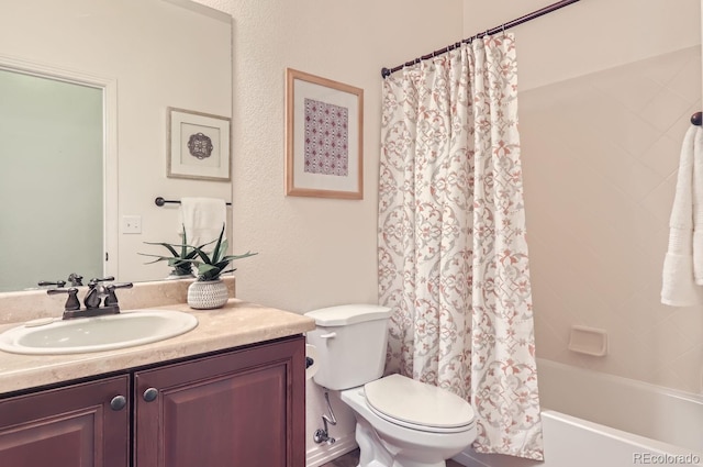 full bathroom featuring toilet, vanity, and shower / bathtub combination with curtain