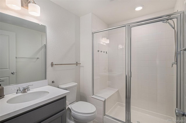 6027 N Netherland Ct, Aurora, CO 80019 - bathroom featuring a shower stall and vanity