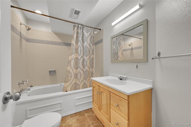 3615 Birnamwood Dr, Colorado Springs, CO 80920 - full bath with shower / bath combo with shower curtain, toilet, and vanity