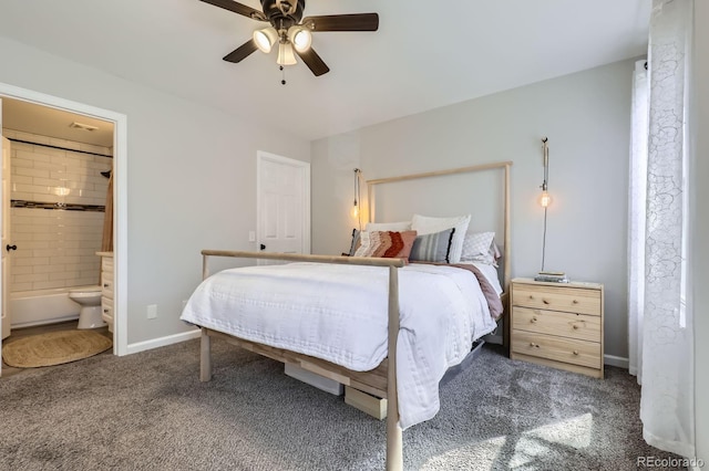 bedroom with carpet floors, connected bathroom, a ceiling fan, and baseboards