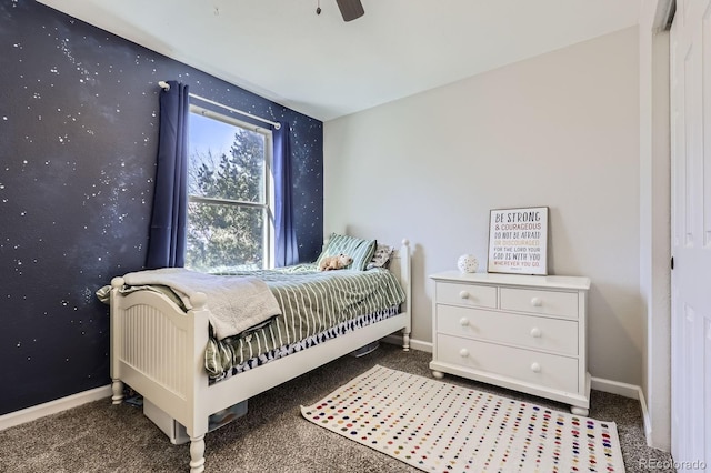 carpeted bedroom featuring a ceiling fan and baseboards