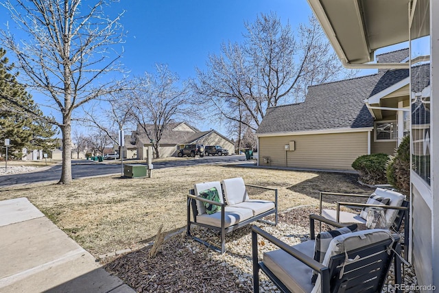 view of yard featuring a residential view