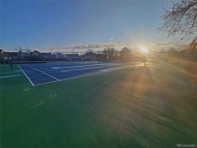 view of sport court with fence