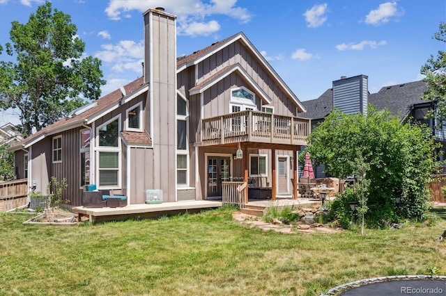 1744 Brookside Dr, Highlands Ranch, CO 80126 - back of house featuring a chimney, board and batten siding, a wooden deck, and a balcony
