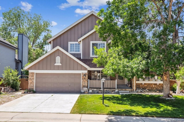1744 Brookside Dr, Highlands Ranch, CO 80126 - view of front facade featuring board and batten siding, driveway, a front yard, stone siding, and an attached garage