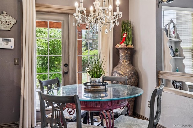 1744 Brookside Dr, Highlands Ranch, CO 80126 - dining area featuring a chandelier